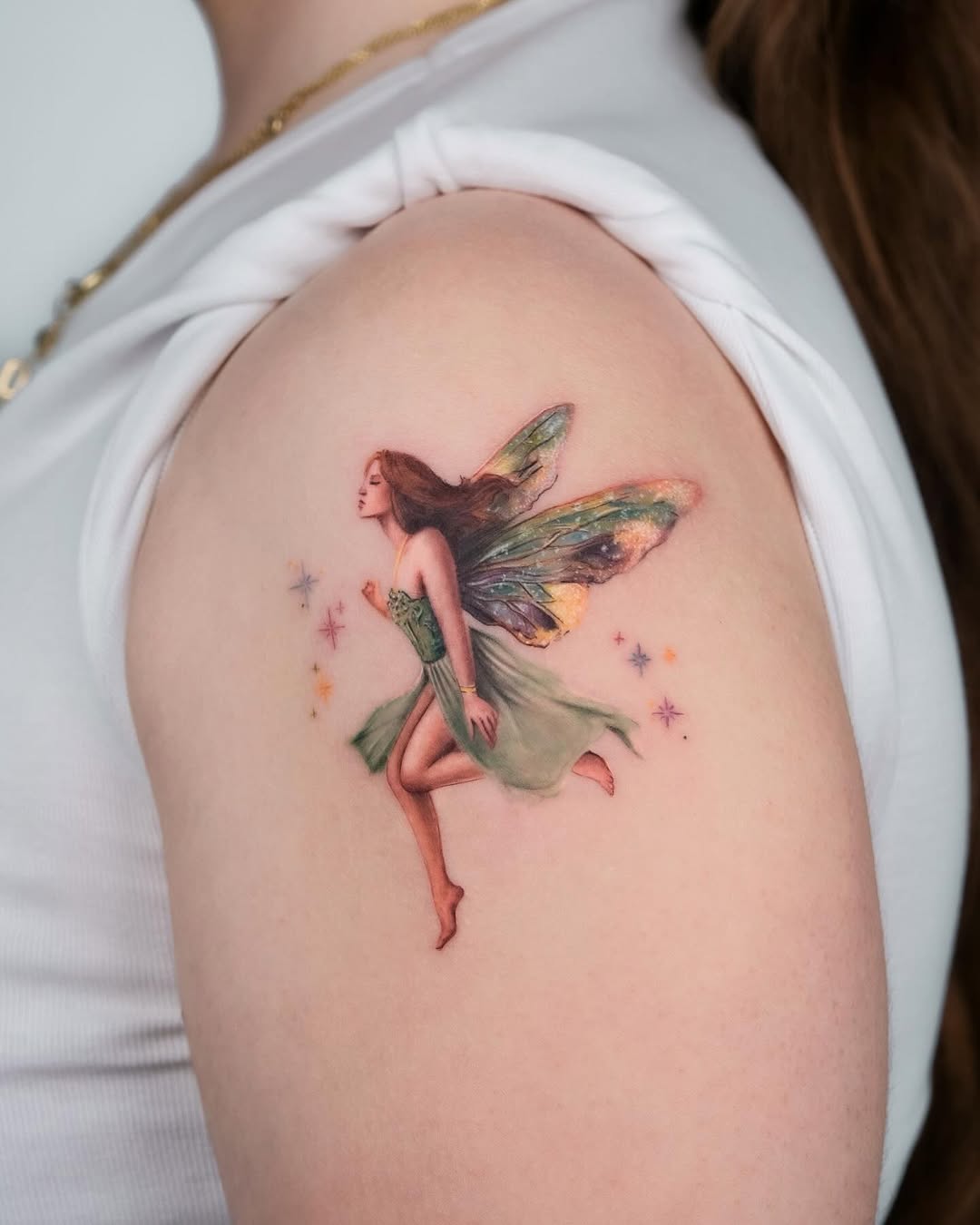 Whimsical fairy tattoo brings magic to life