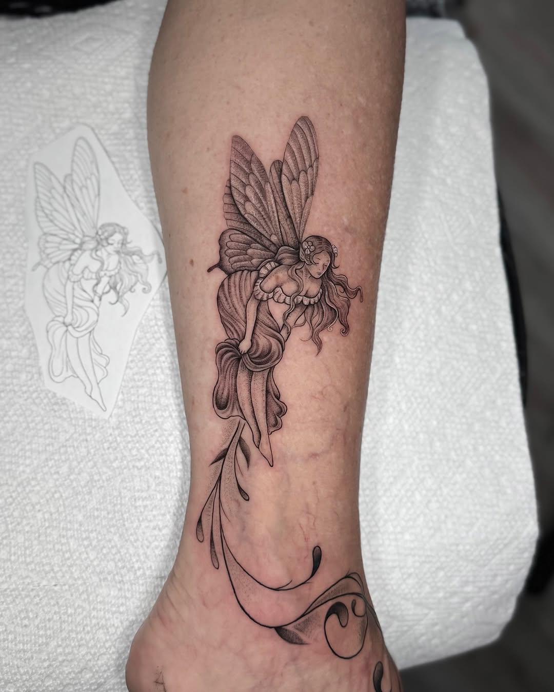Delicate Fairy Tattoo with Elegant Details