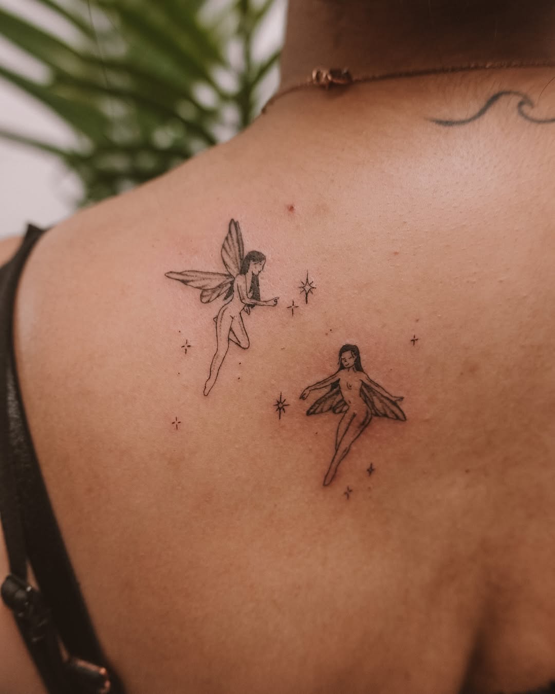Enchanting fairy tattoo design on the back
