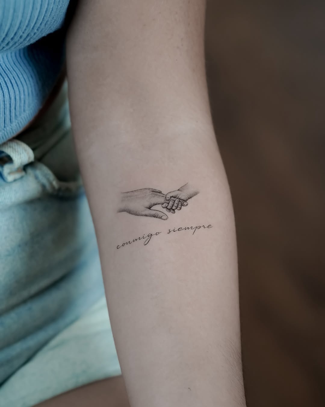 Symbolic bond between family members expressed.