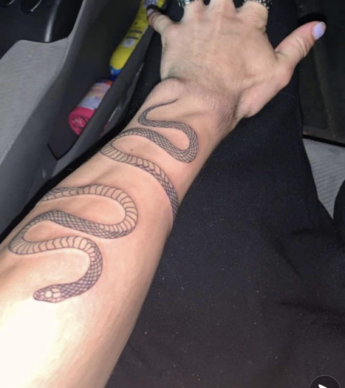 Thoughts on snake arm tattoos. Are they a trend or are they ...
