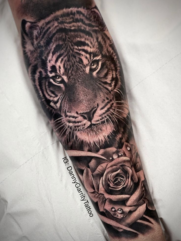 Mens black and grey realistic tiger sleeve tattoo