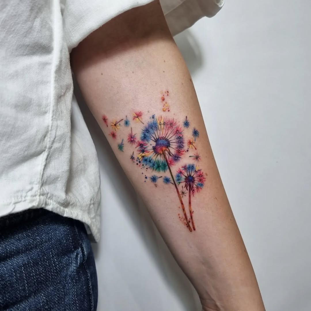 Vibrant watercolor dandelion tattoo design