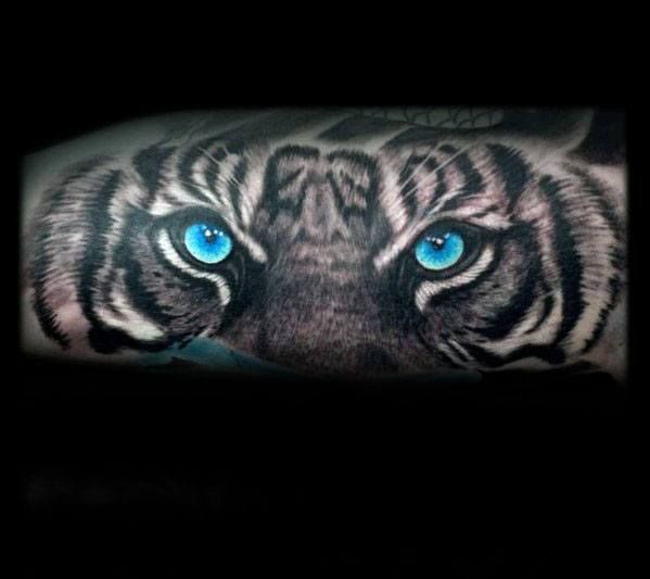 40 Imposing Tiger Eyes Tattoo Designs for Men