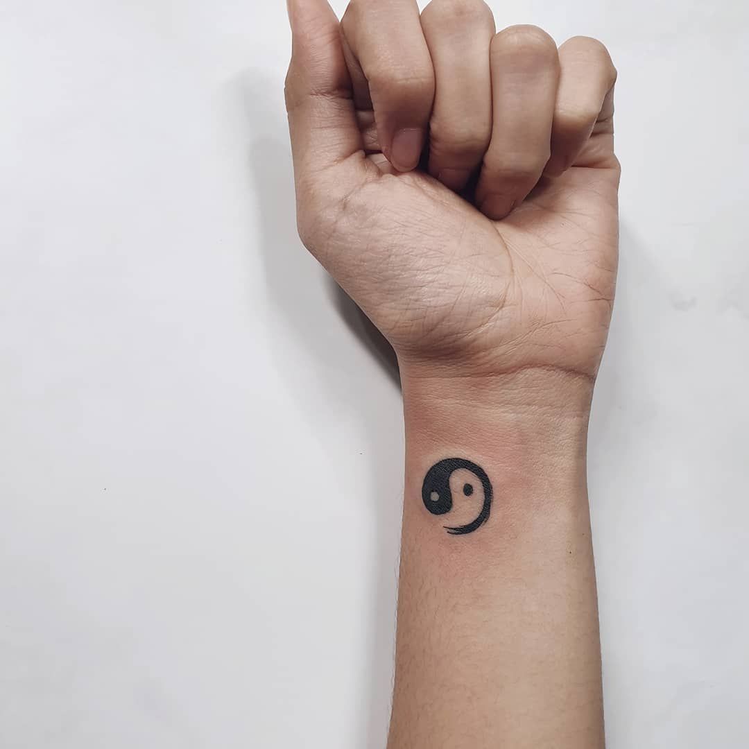 Disappearing Yin-Yang Tattoo