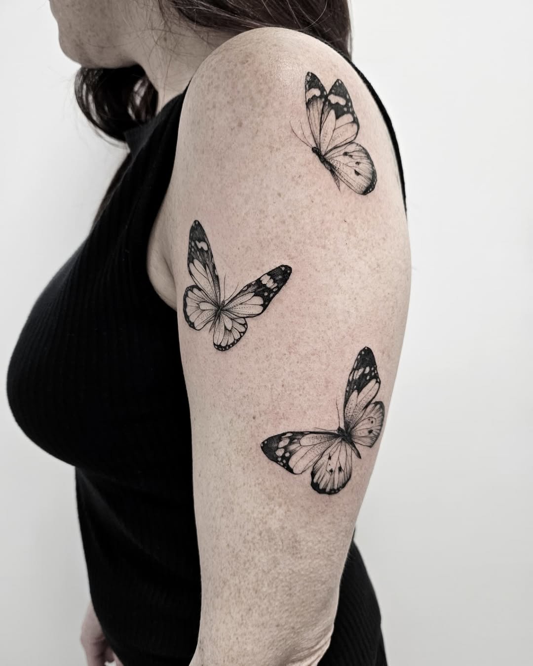 Elegant butterfly tattoos for women’s arms