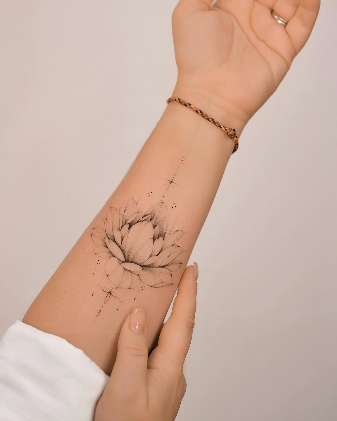 Elegant floral arm tattoo inspiration for women