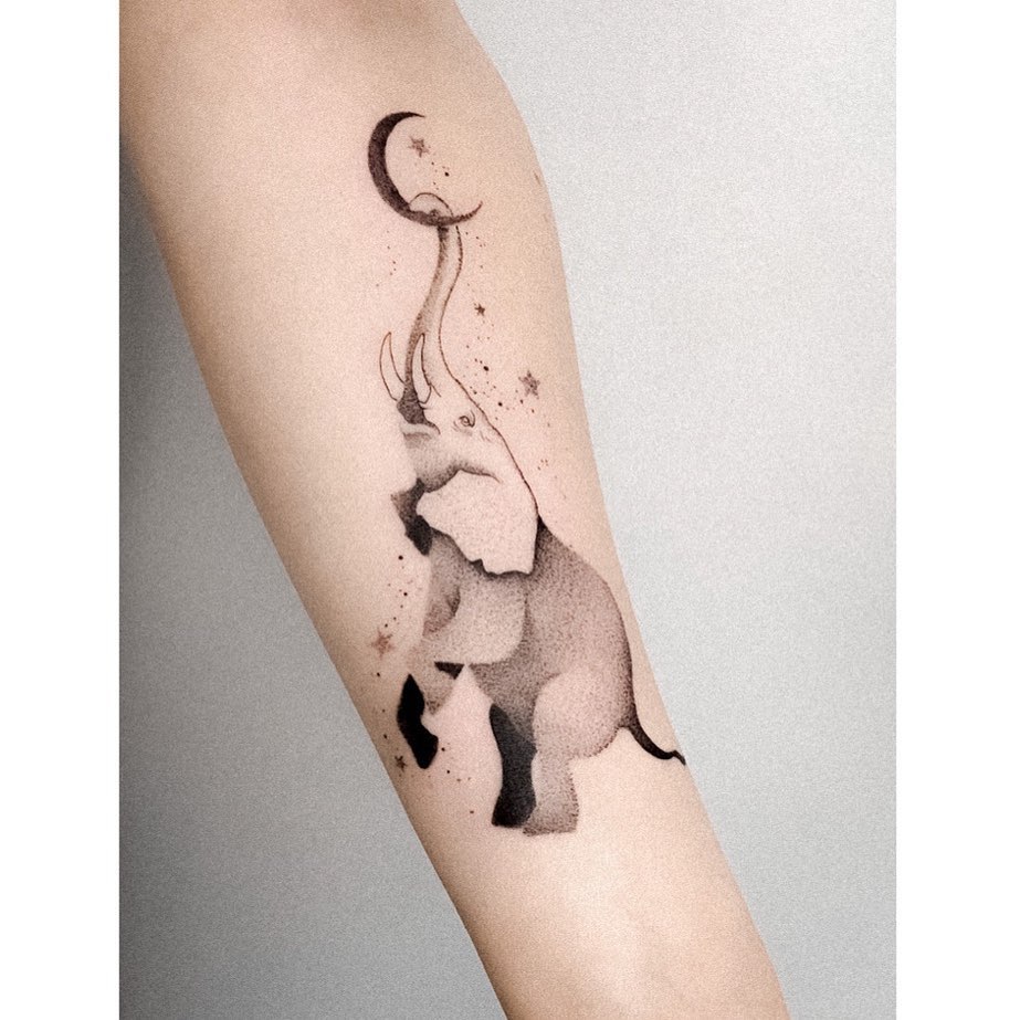 Whimsical elephant with moon and stars design