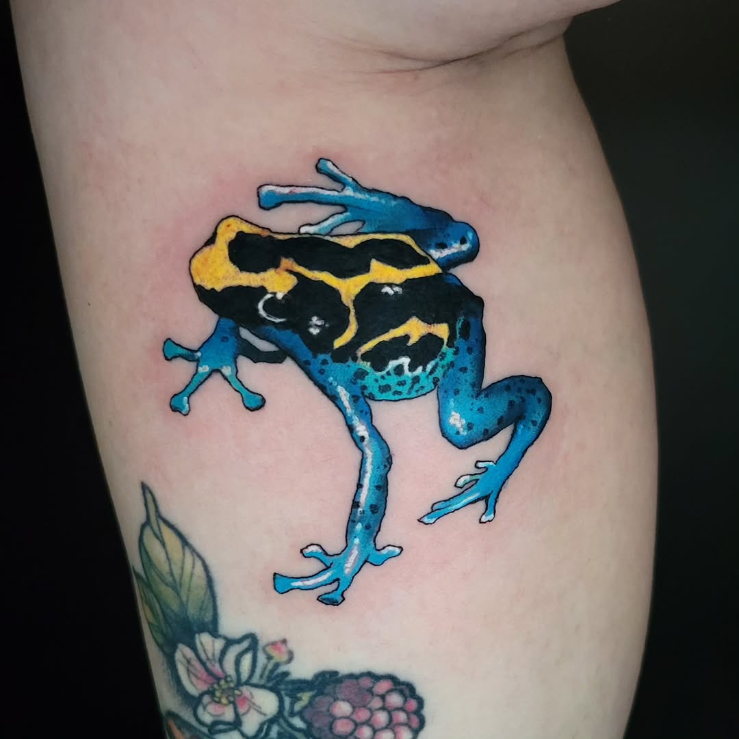Colorful frog tattoo with intricate detailing