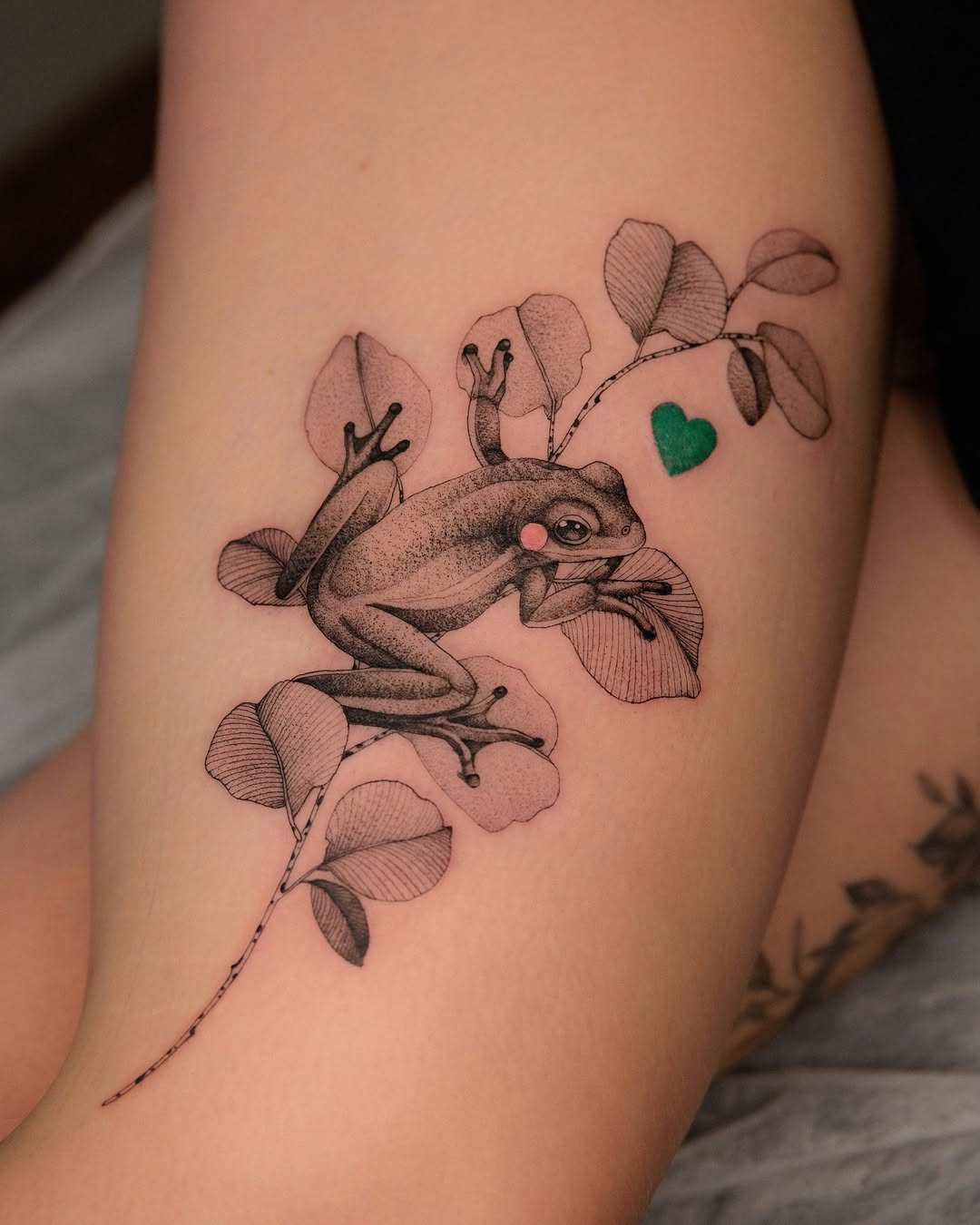 Stunning Frog Tattoo with Leafy Elements