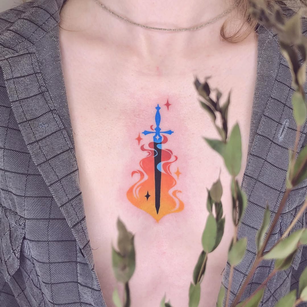 Vibrant sword tattoo surrounded by fiery colors
