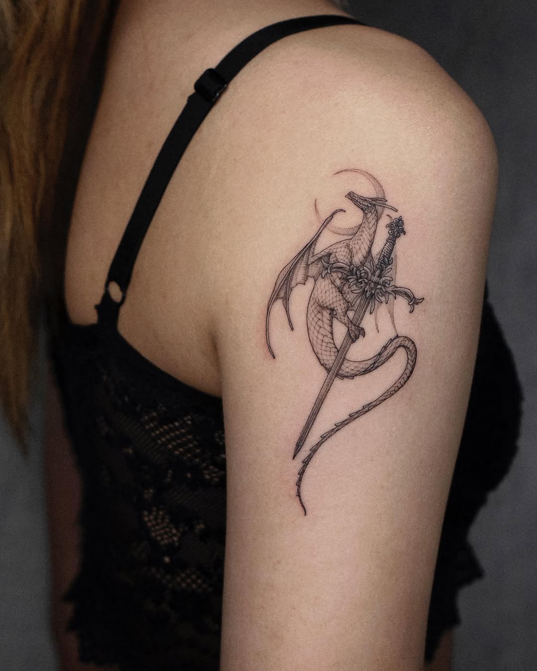 Intricate Sword and Dragon Tattoo Design