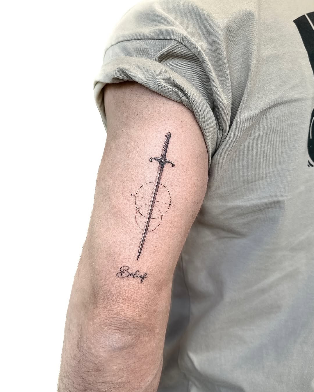 Geometric Sword Tattoo with Meaningful Text