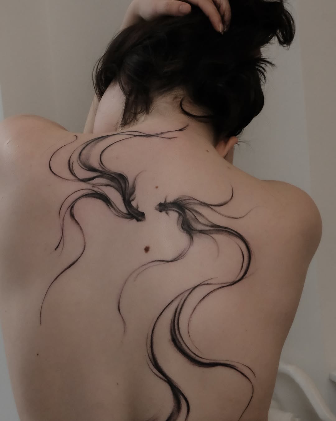 Fluid and sensual designs on the back