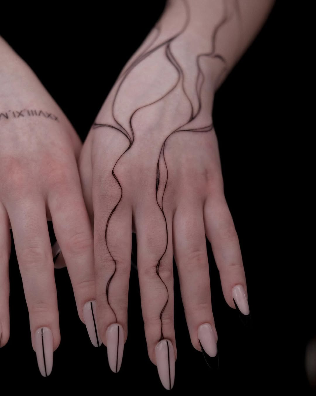 Flowing lines create elegant abstract tattoo design
