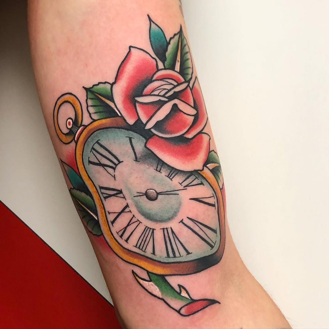 Intricate Salvador Dali clock and rose tattoo