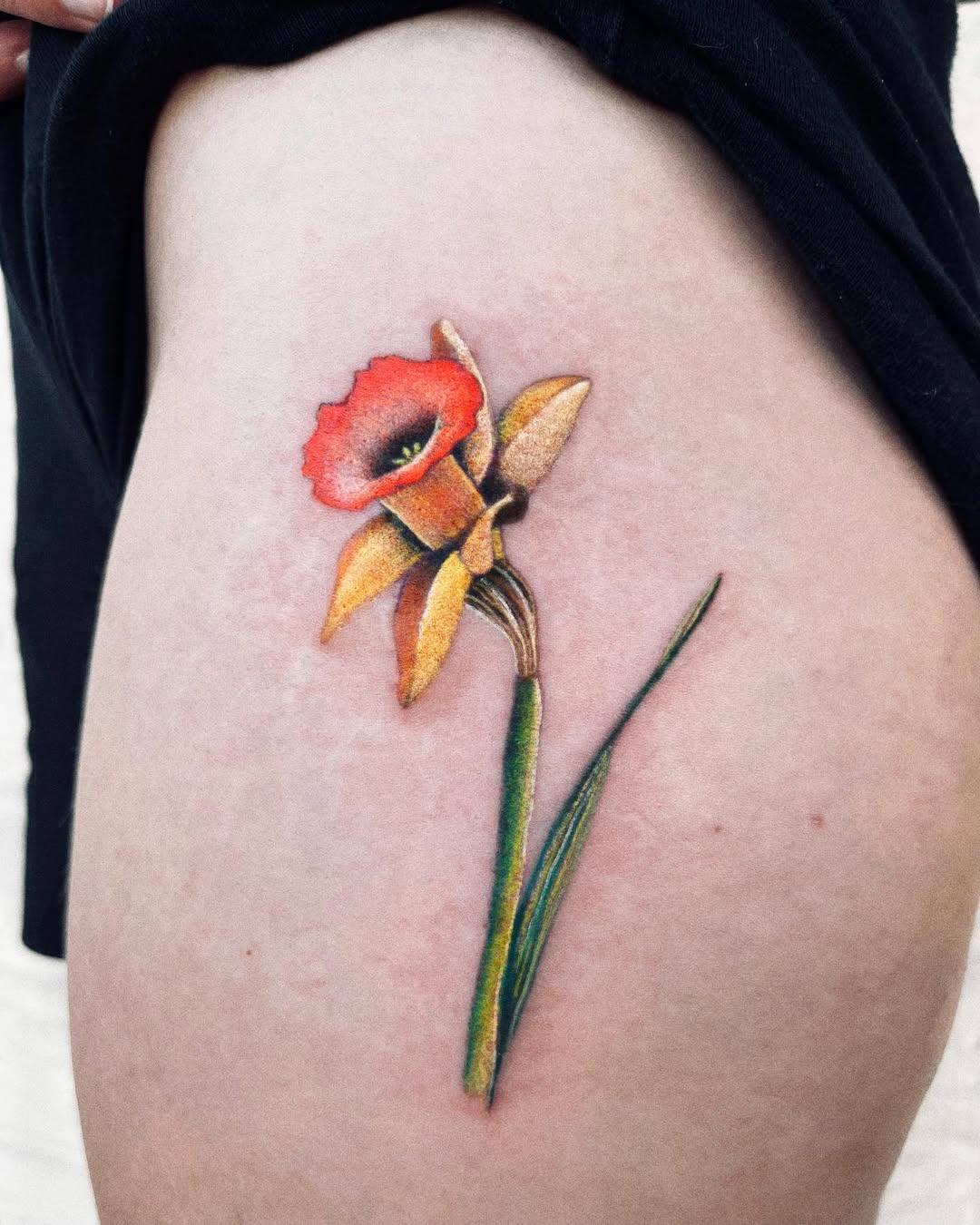 Vibrant Flower Tattoo Symbolizing Rebirth
