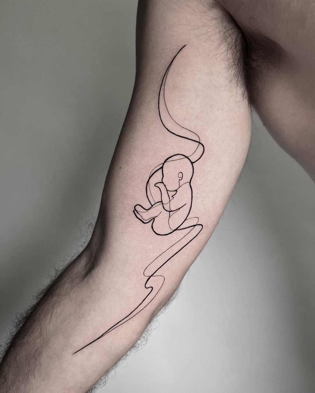 Minimalist tattoo symbolizing new beginnings