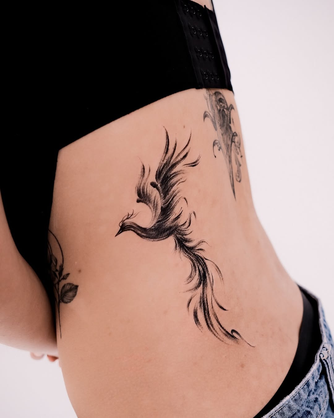Elegant Phoenix Tattoo Signifying Rebirth