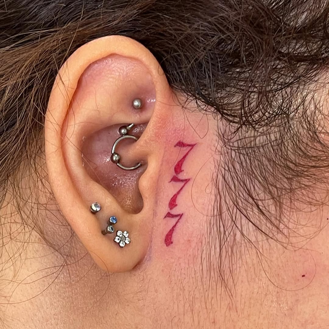 Unique 777 Tattoo Behind the Ear