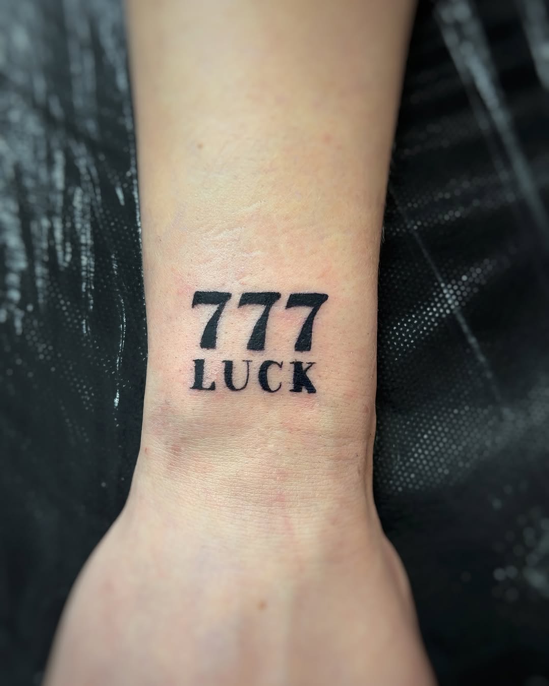 Symbolic 777 Tattoo Representing Luck