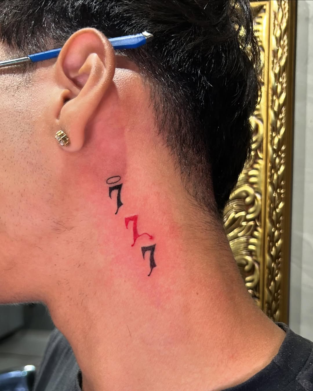 Stylish 777 Tattoo On The Neck