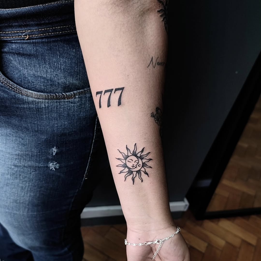 Bold sun and 777 tattoo combination design