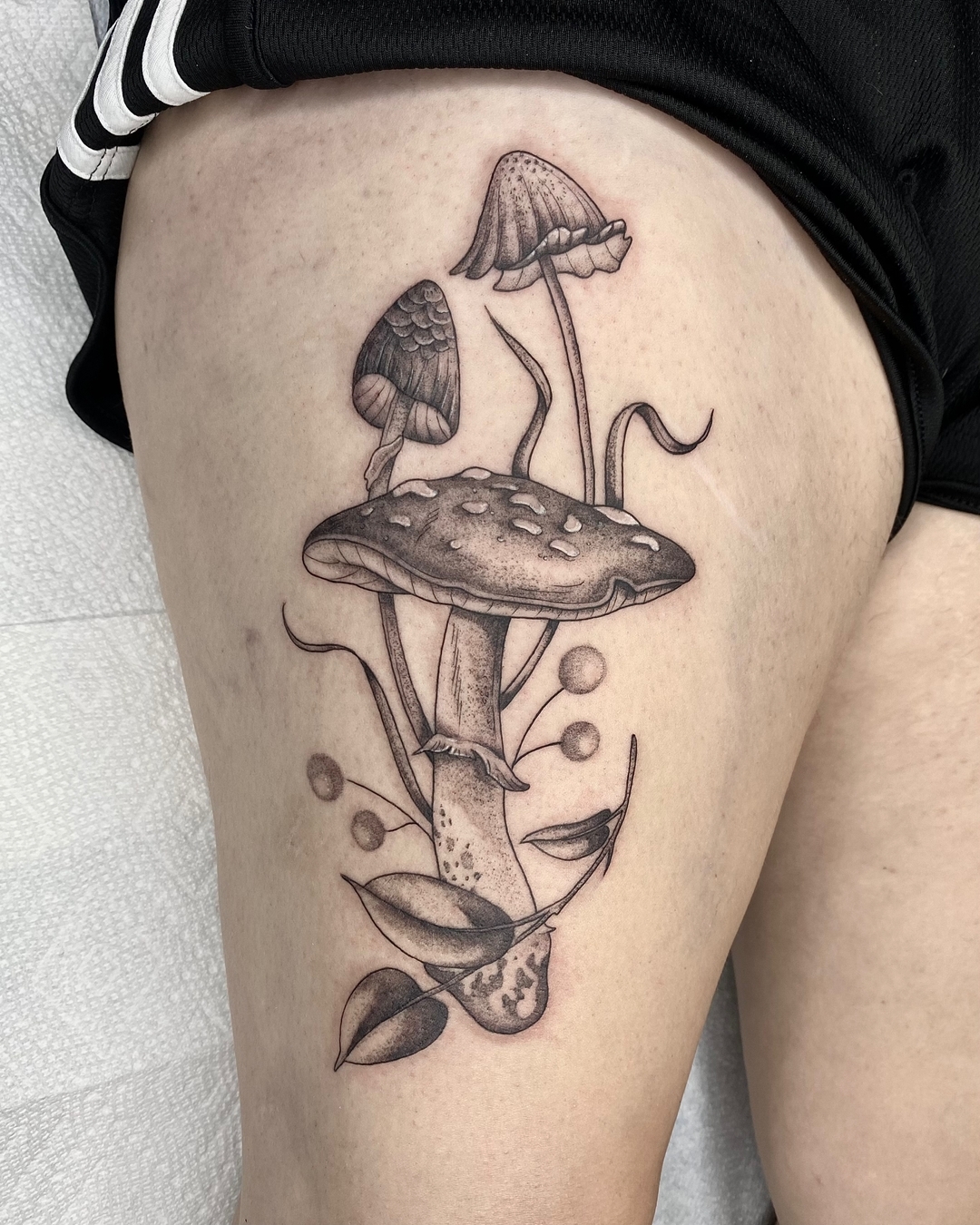 Colorful mushroom tattoos with playful designs