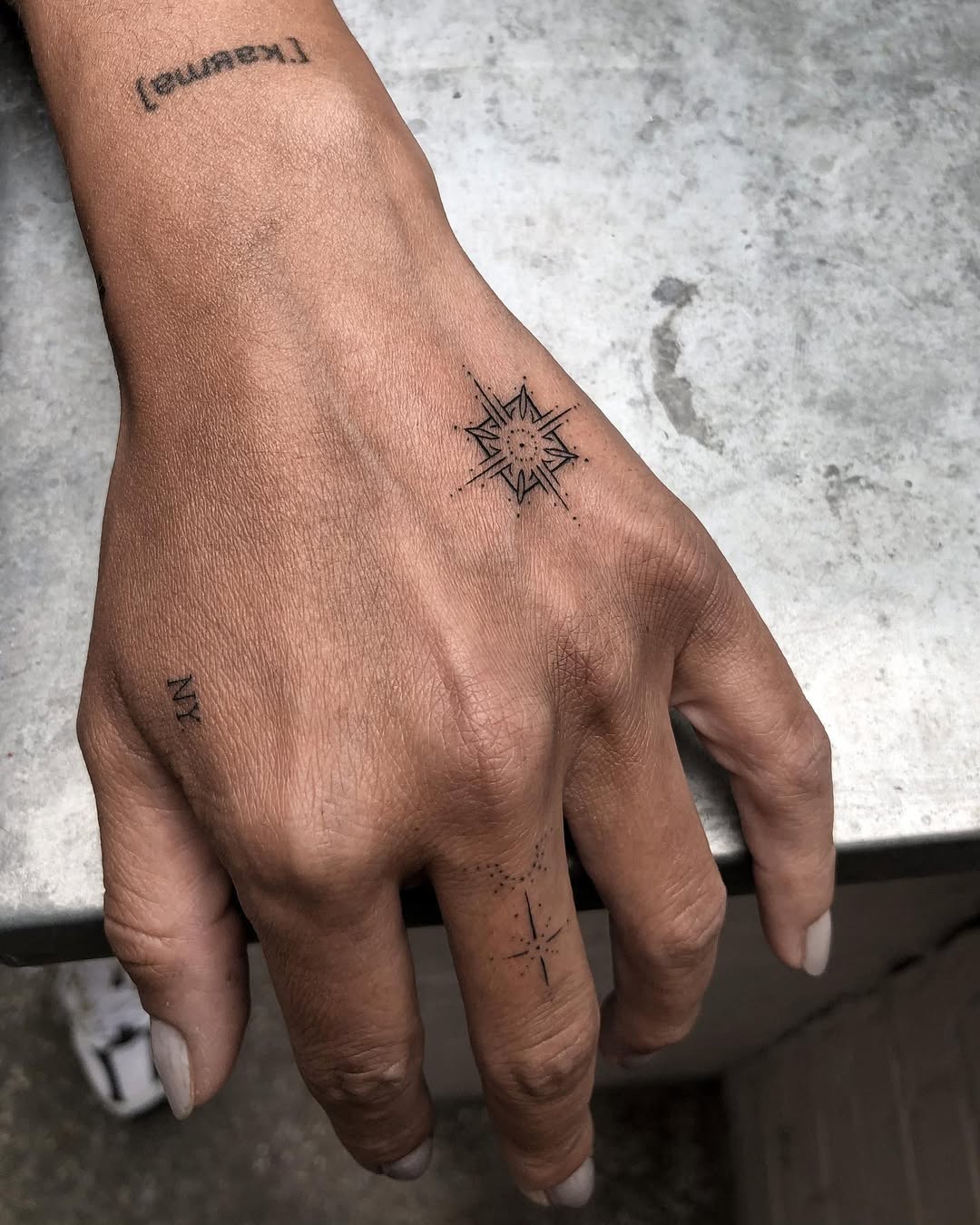 Intricate mandala design on hand