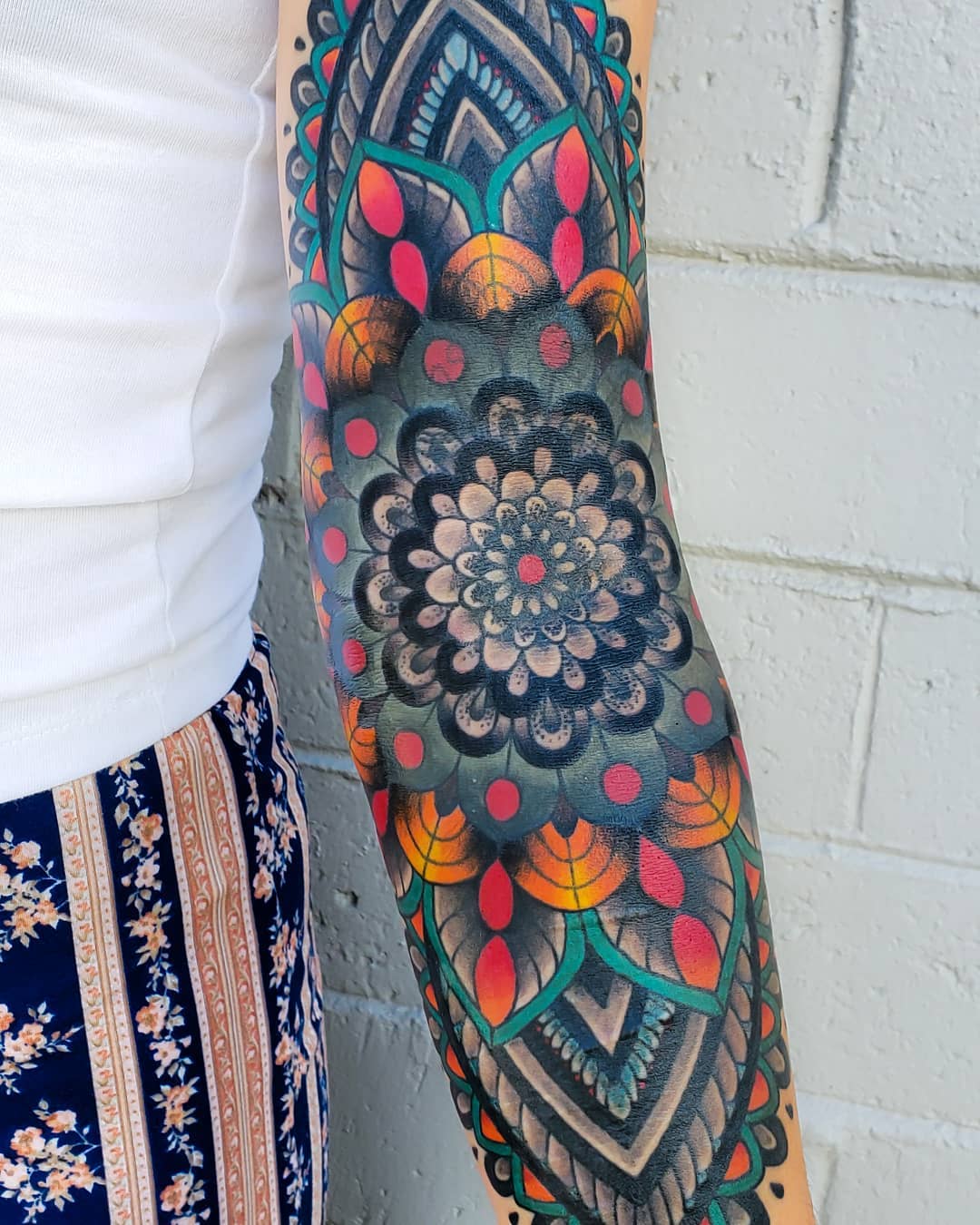 Colorful Mandala Tattoo Adorning the Arm