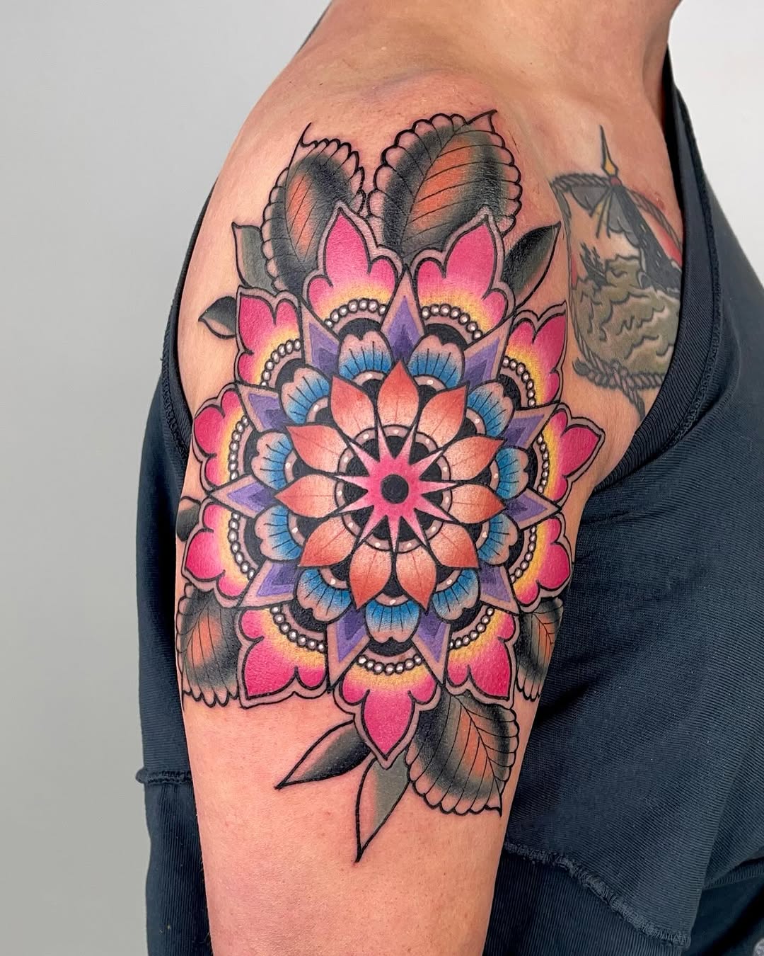 Vibrant floral mandala tattoo showcasing intricate details
