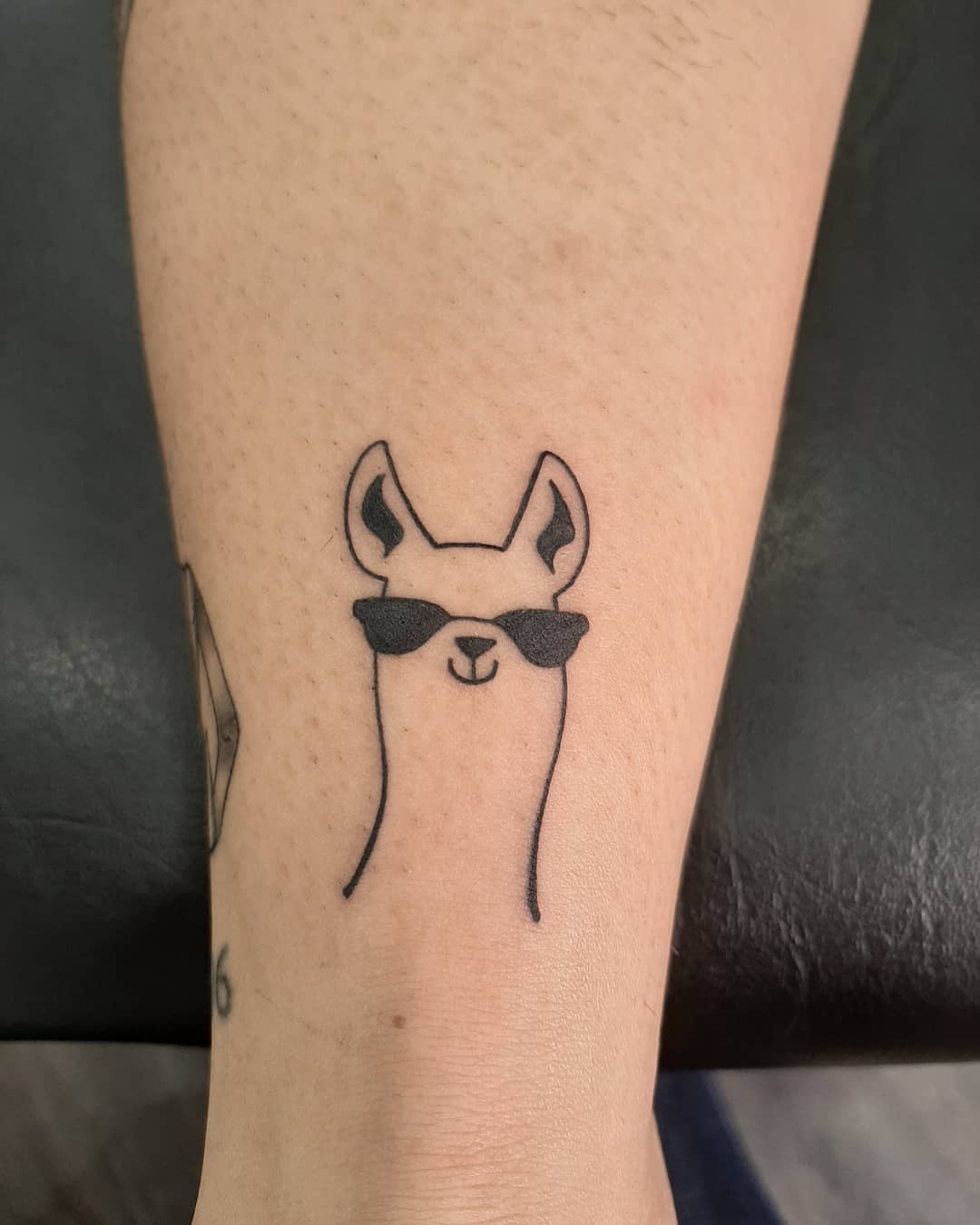 Cool and trendy llama tattoo design