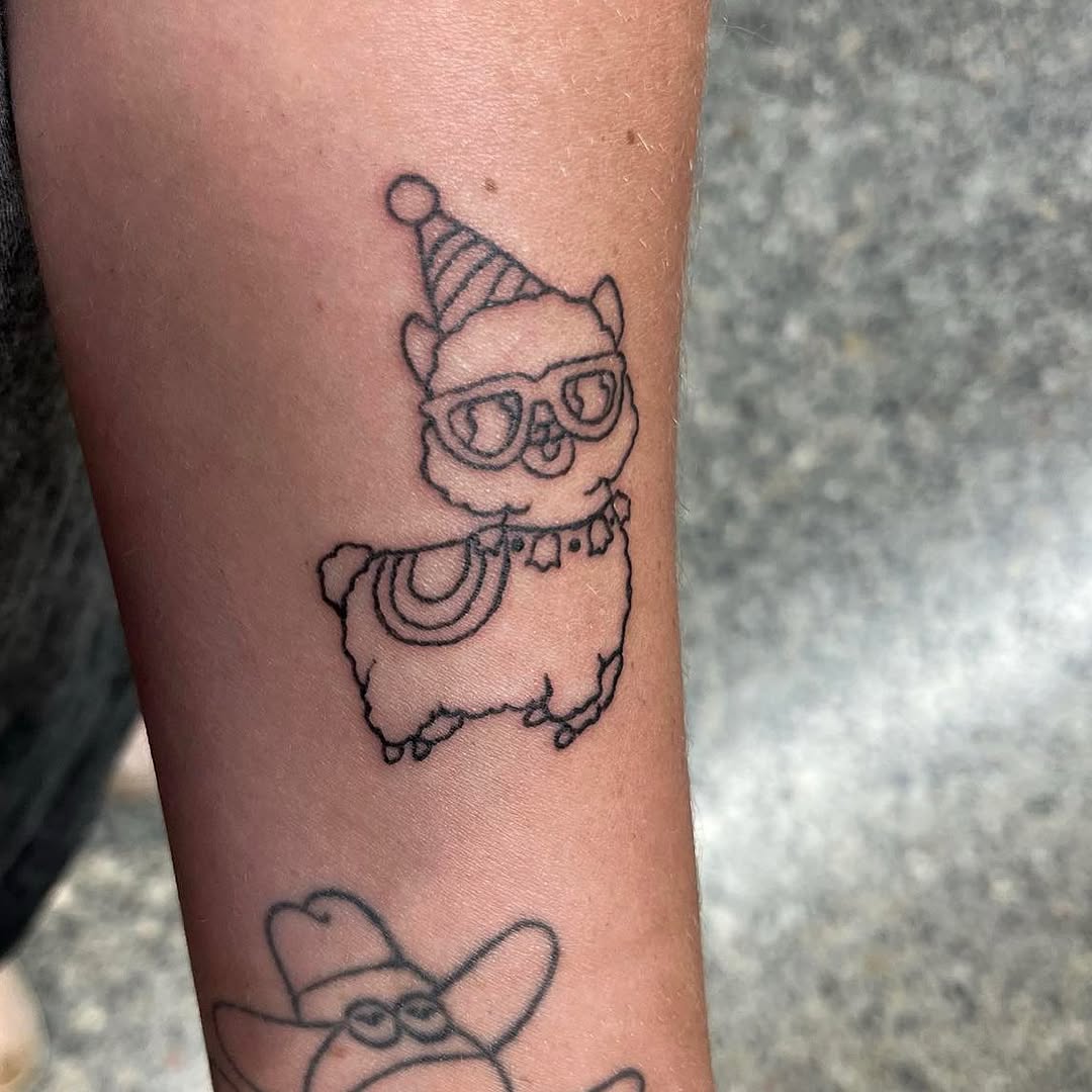 Adorable llama tattoo with playful vibe