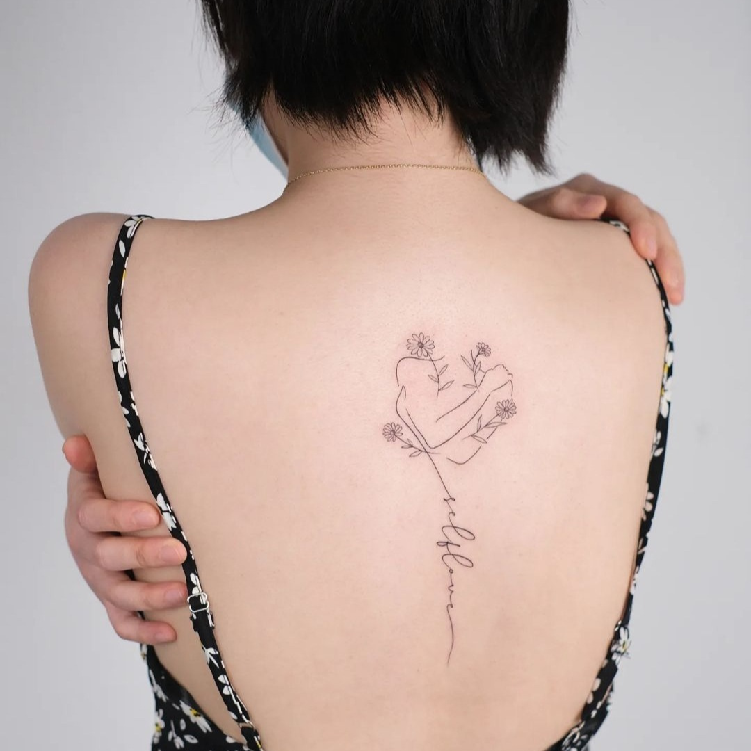 Self-love fine line art tattoo