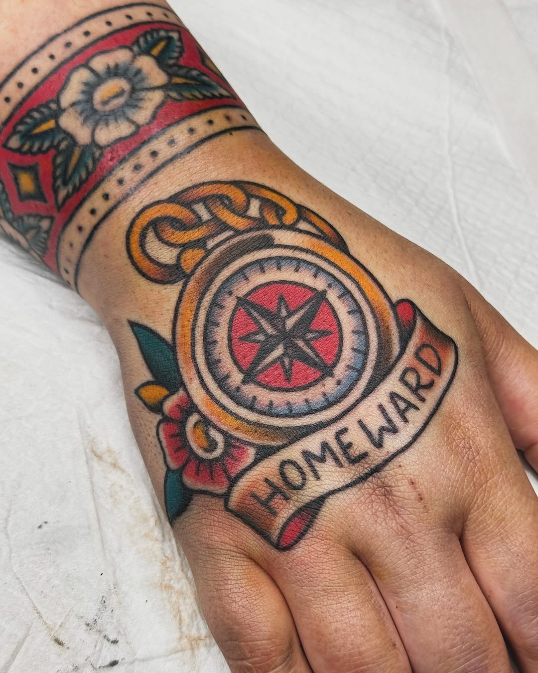 Vibrant compass tattoo with a heartfelt message