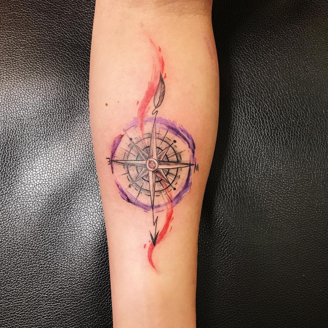 Vibrant Compass Tattoo with Artistic Flair