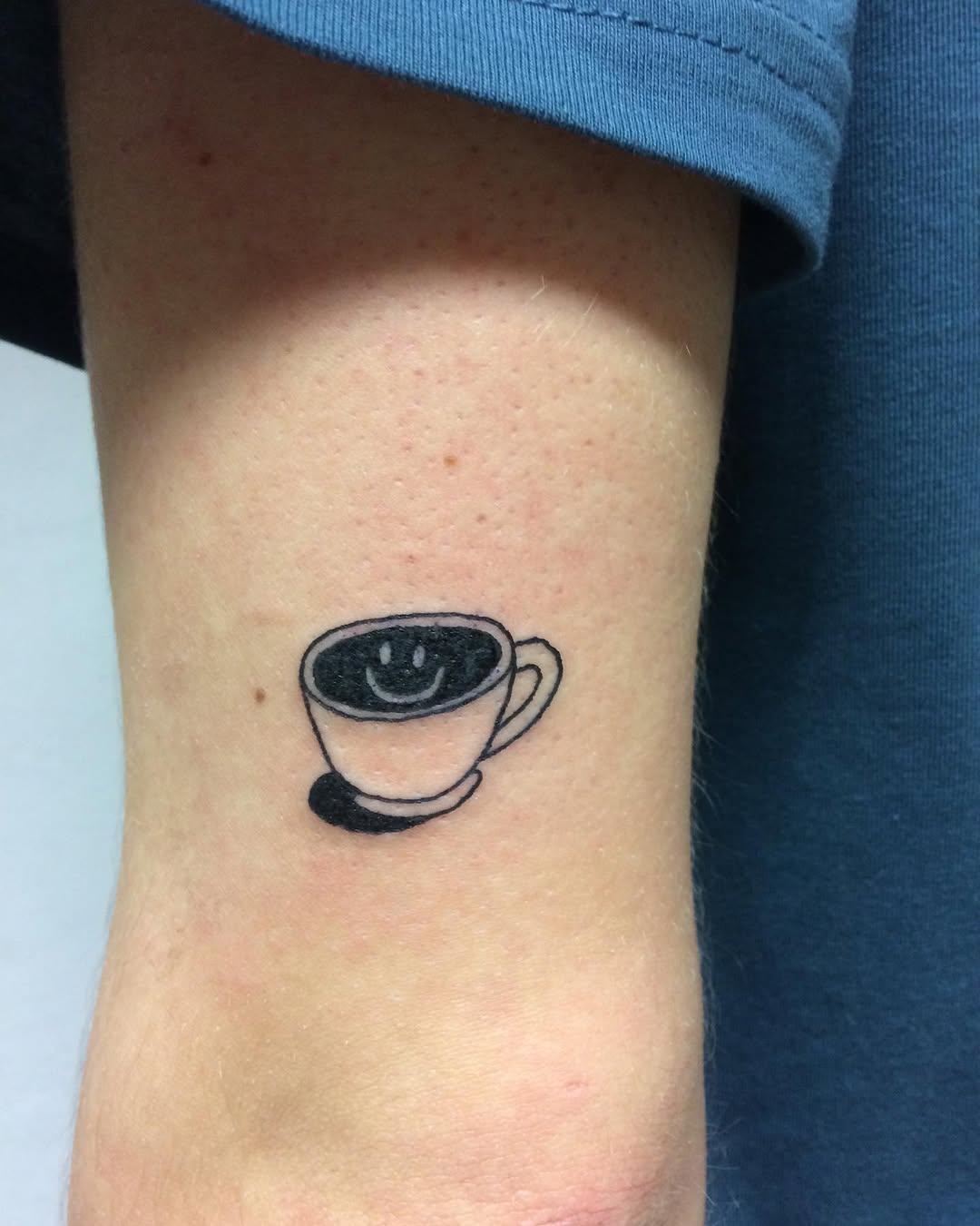 Cute coffee tattoo brings joyful vibes