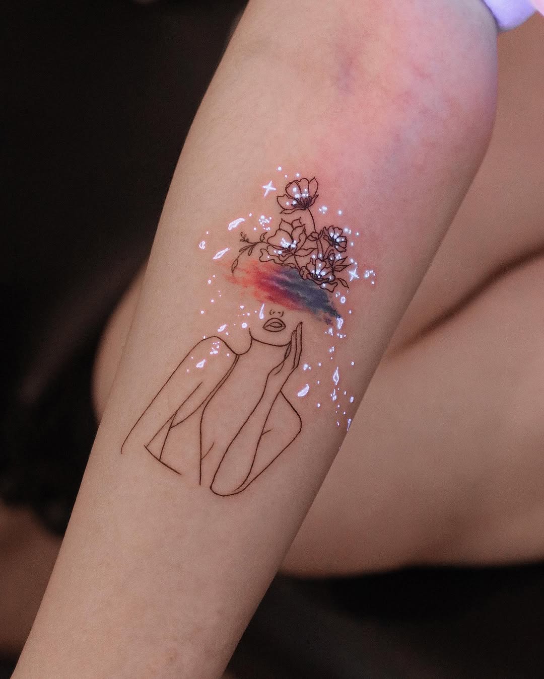 Minimalist tattoo with floral dreamscape
