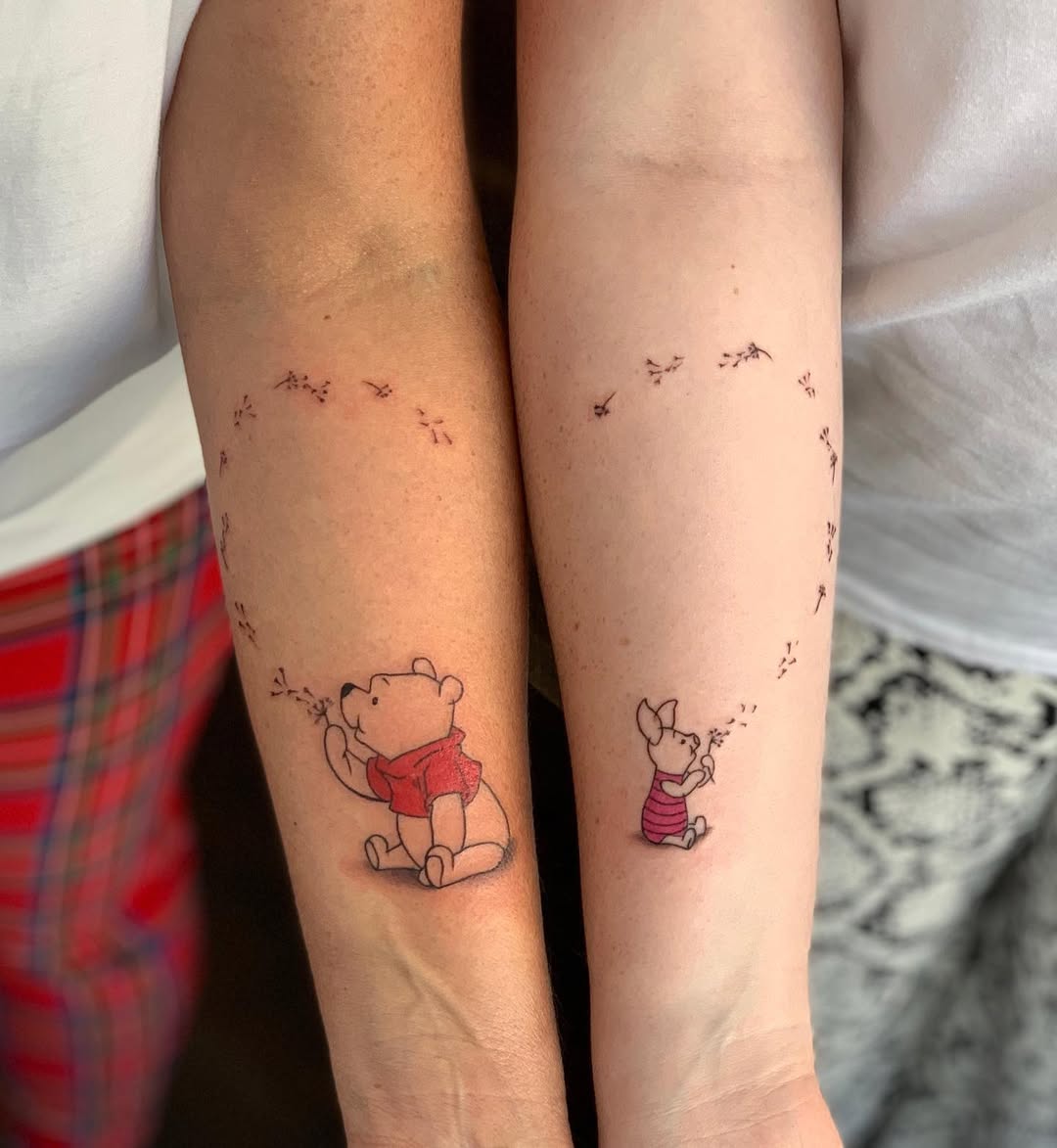 Heartwarming Winnie the Pooh mother-daughter tattoos