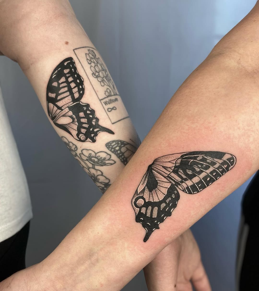 Beautiful butterfly tattoos symbolizing mother-daughter bond