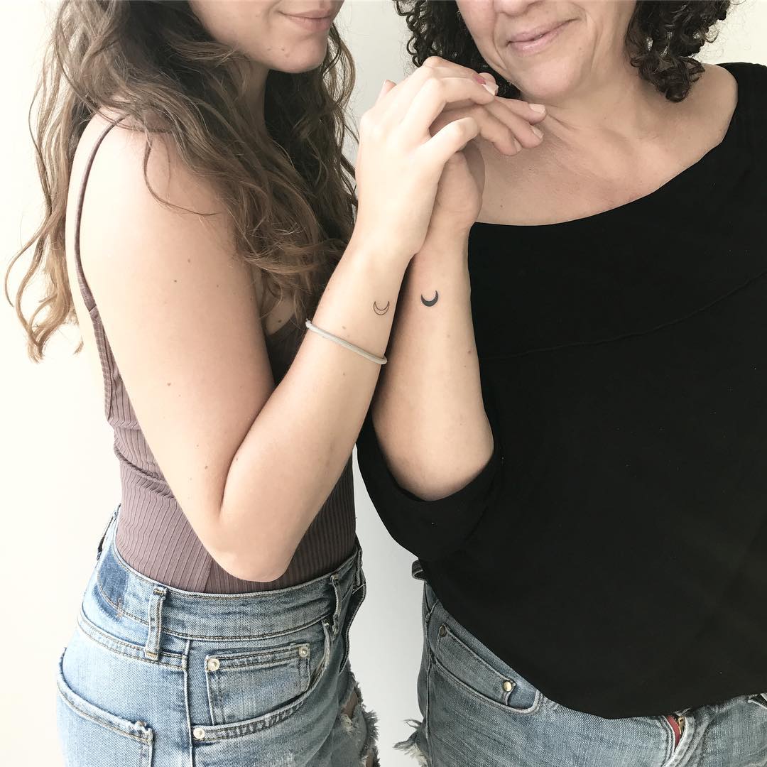 Charming moon tattoos for mother-daughter bond