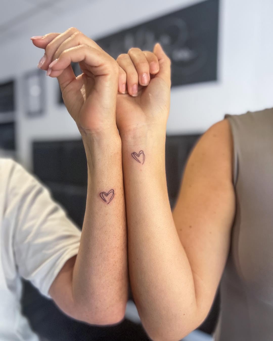 Minimalistic hearts symbolize unbreakable bond