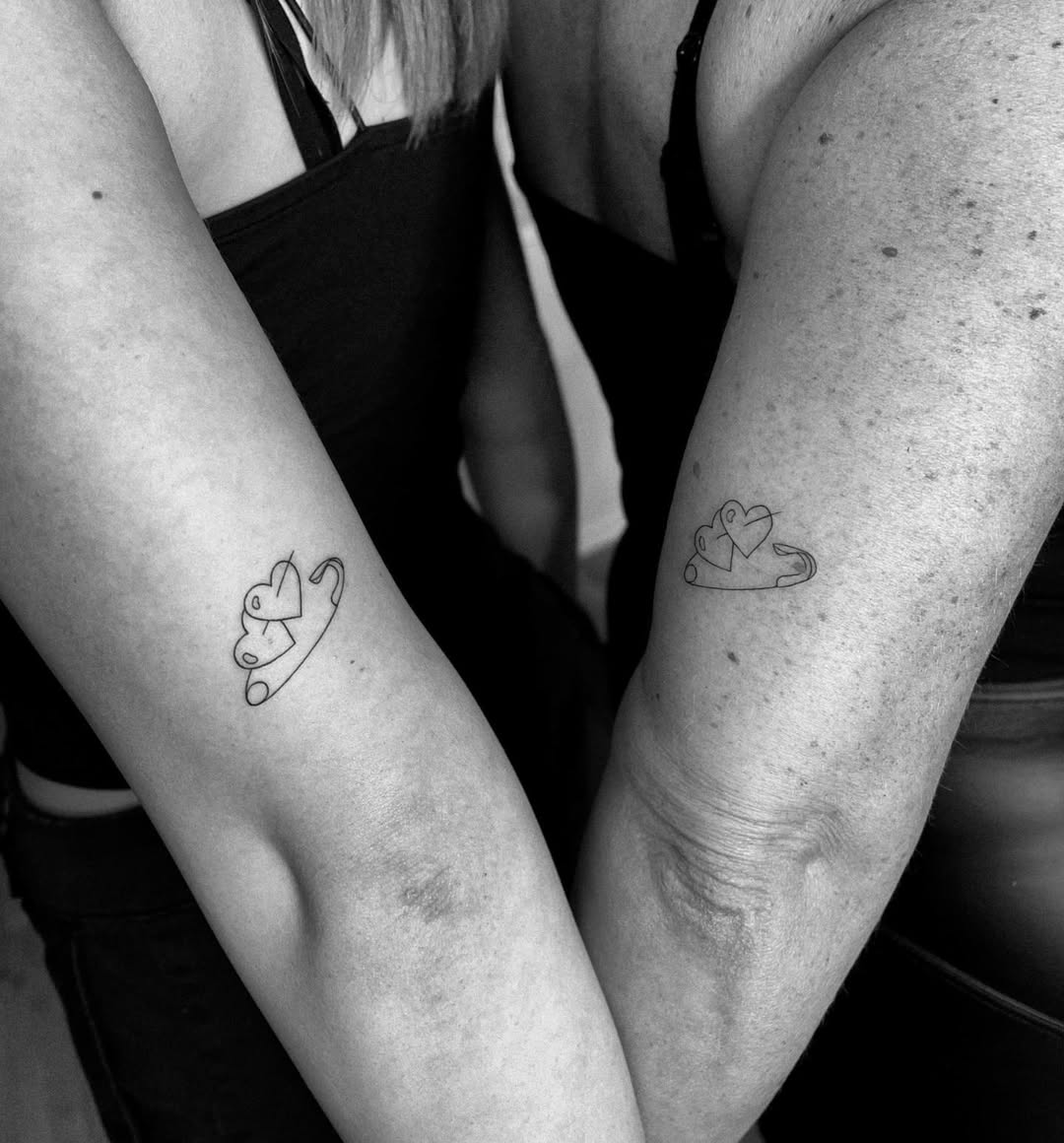 Symbolic heart tattoos representing strong bond