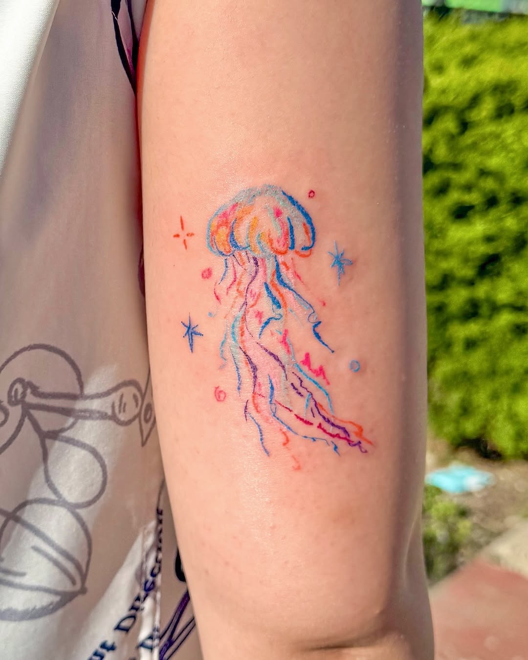 Vibrant jellyfish tattoo with colorful details