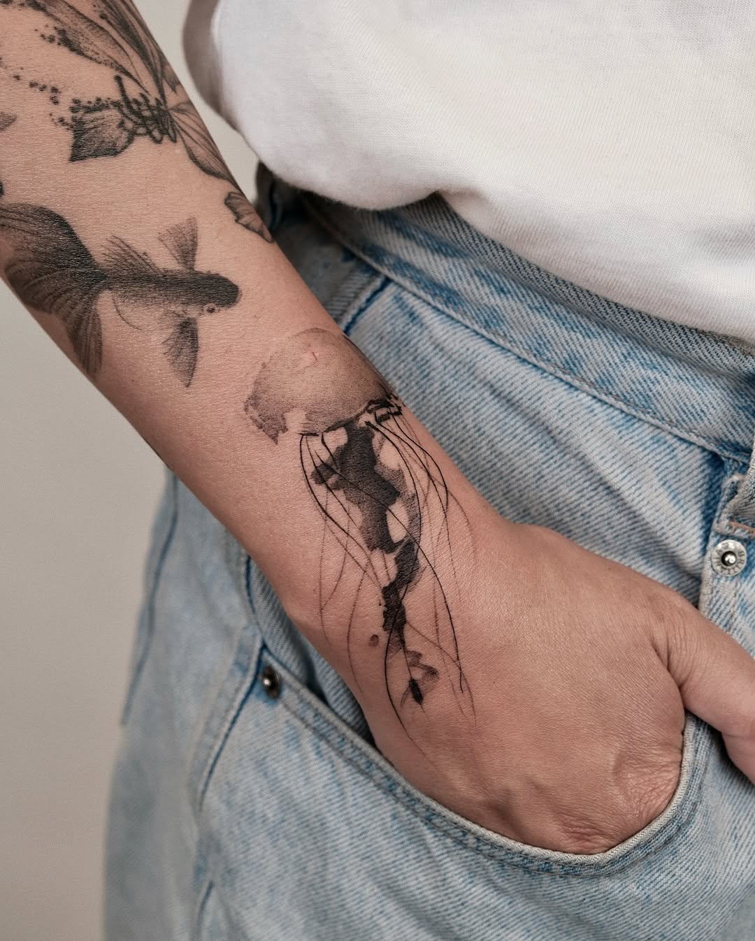 Delicate jellyfish tattoo with artistic flair