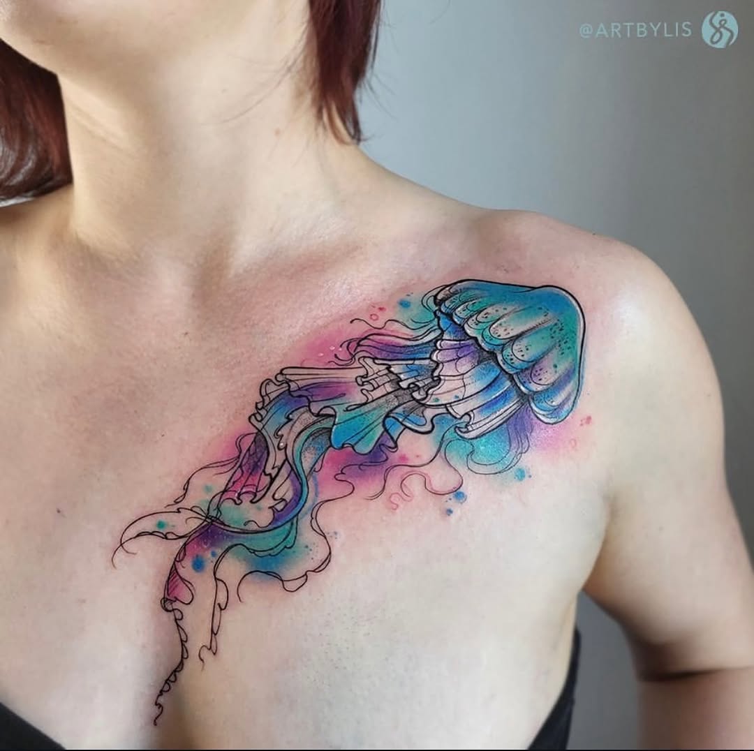Stunning watercolor jellyfish tattoo on shoulder