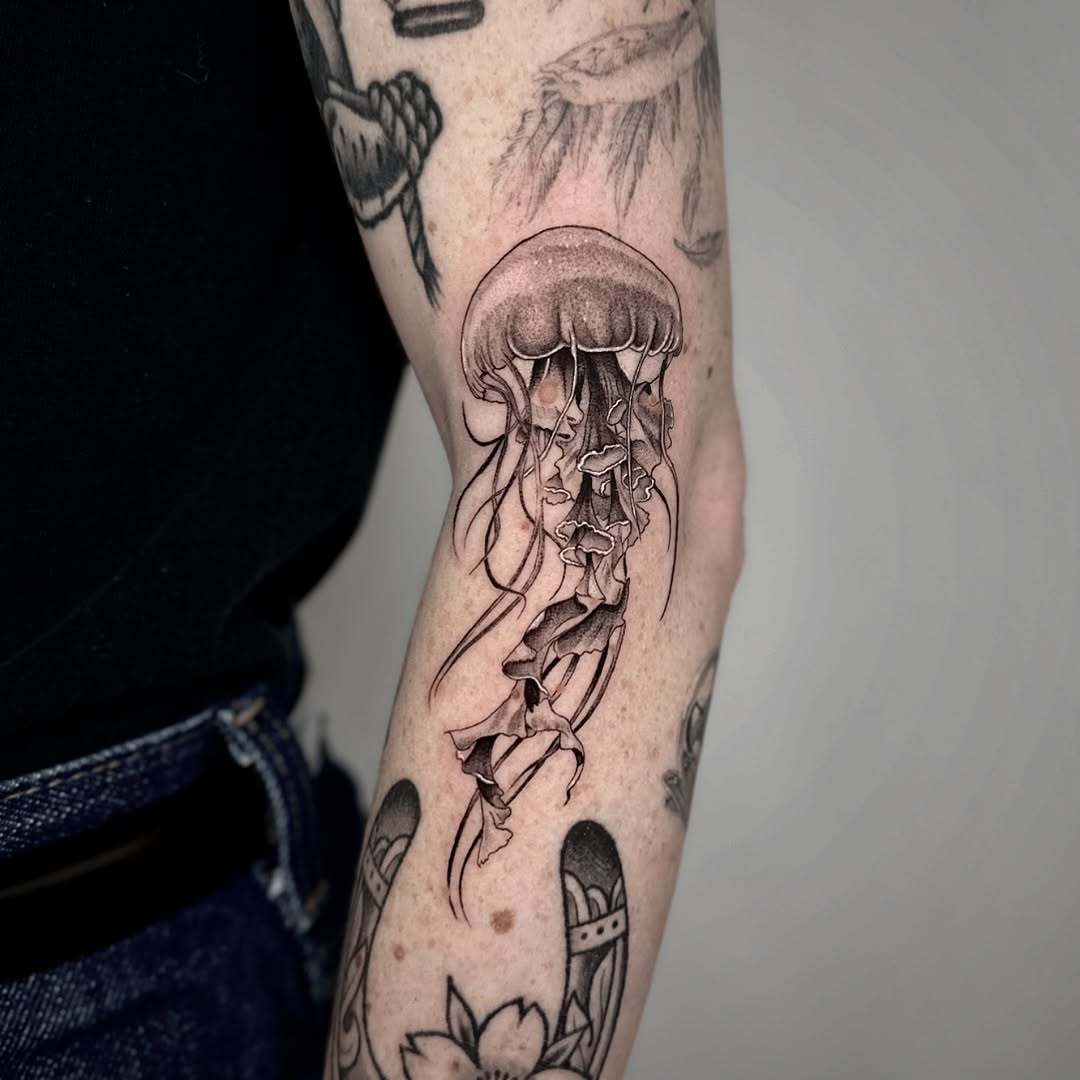 Mesmerizing jellyfish ink art on skin