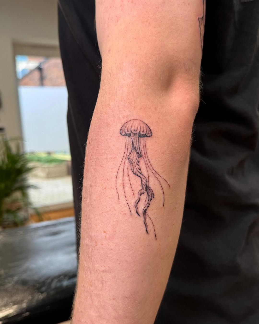 Elegant jellyfish tattoo with flowing tentacles