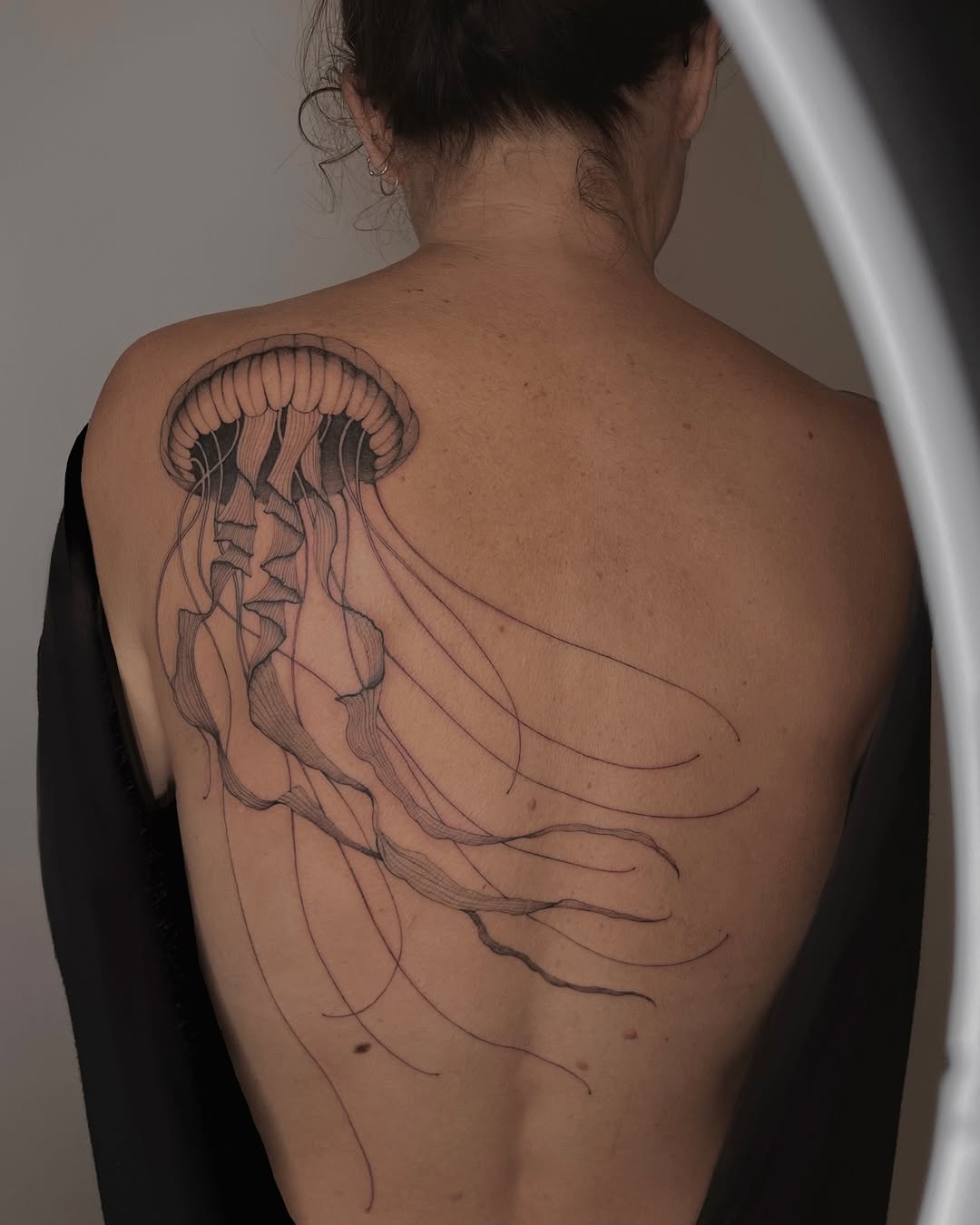 Elegant Jellyfish Tattoo on the Back