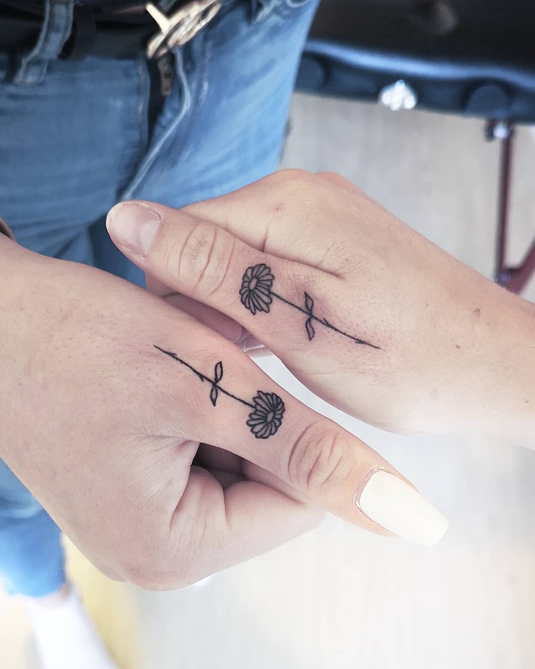 Delicate floral designs symbolizing sibling bonds